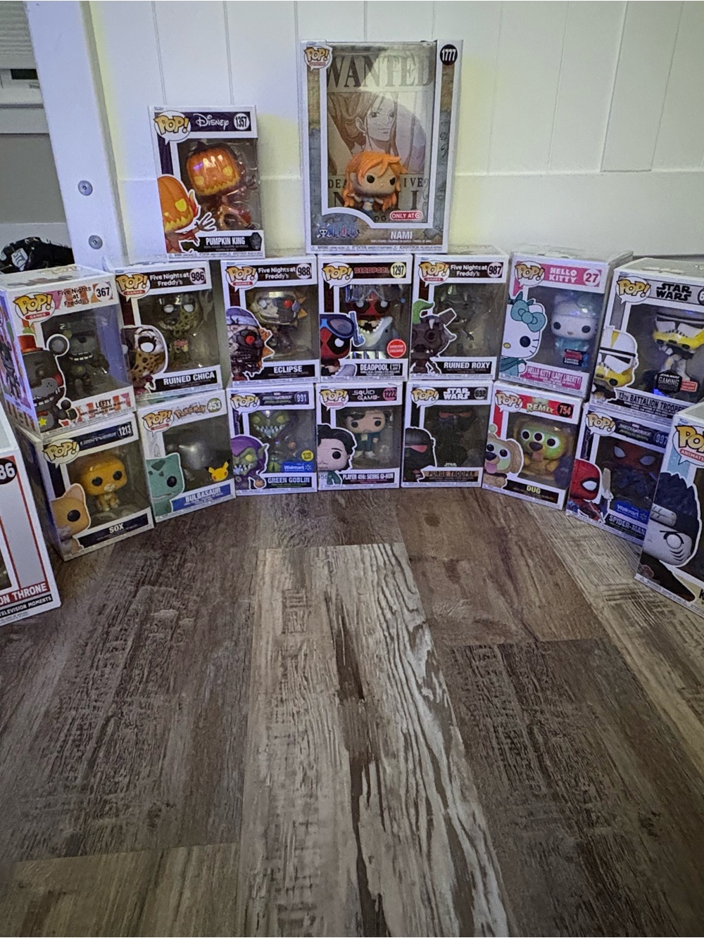 Funko Pop! Assorted Collectible Figures — White, Black, Orange, Yellow, Purple